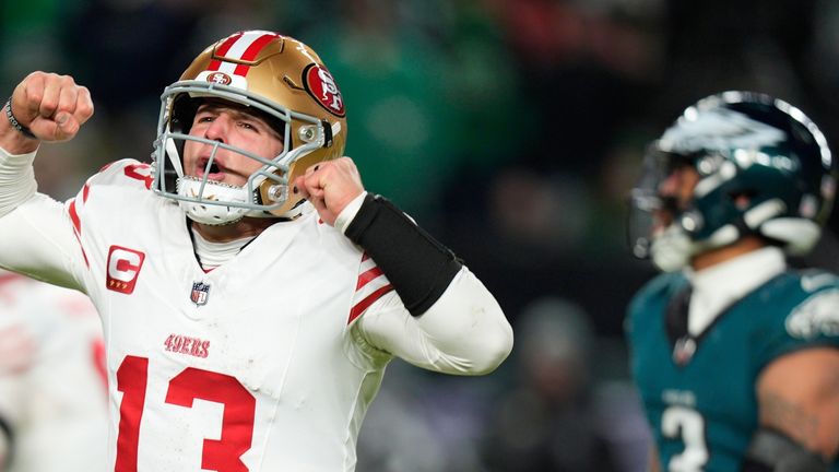 San Francisco 49ers quarterback Brock Purdy celebrates his game-winning touchdown pass to Christian McCaffrey