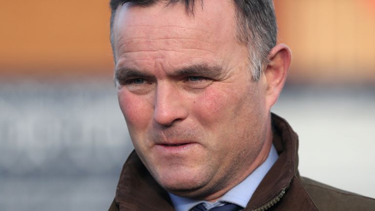 Trainer Evan Williams attacked Martin Dandridge, 72, with a hockey stick, breaking his arm