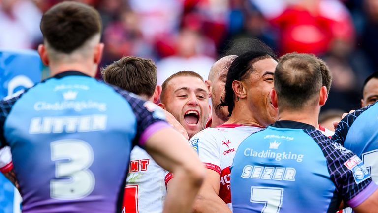 Hull KR's Mikey Lewis celebrates Jack Broadbent's try against Hull FC.