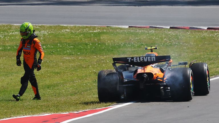 Lando Norris walks away from his McLaren after crashing at the Canadian Grand Prix
