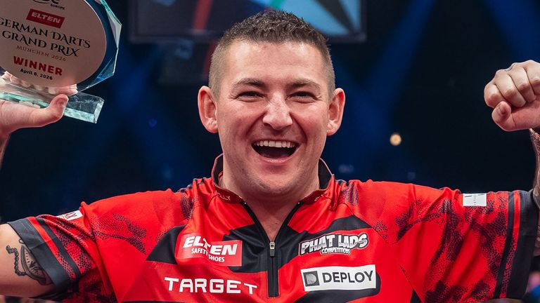 Nathan Aspinall celebrates his victory at the 2026 German Darts Grand Prix (Credit: PDC)