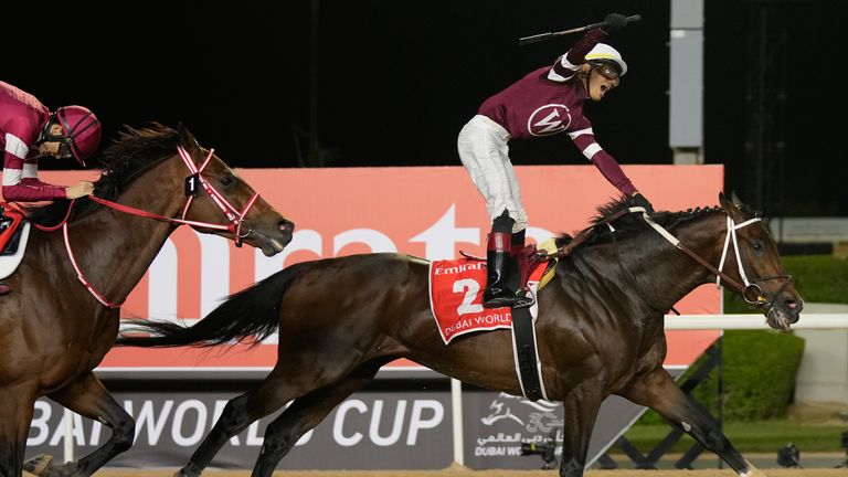Jose Ortiz, aboard Magnitude, celebrates winning the $12m Dubai World Cup