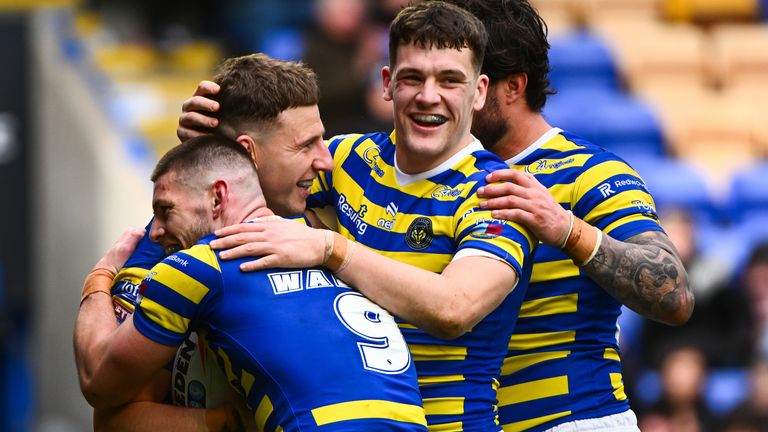Warrington Wolves moved back to the top of the Super League table with their win over Leigh Leopards 